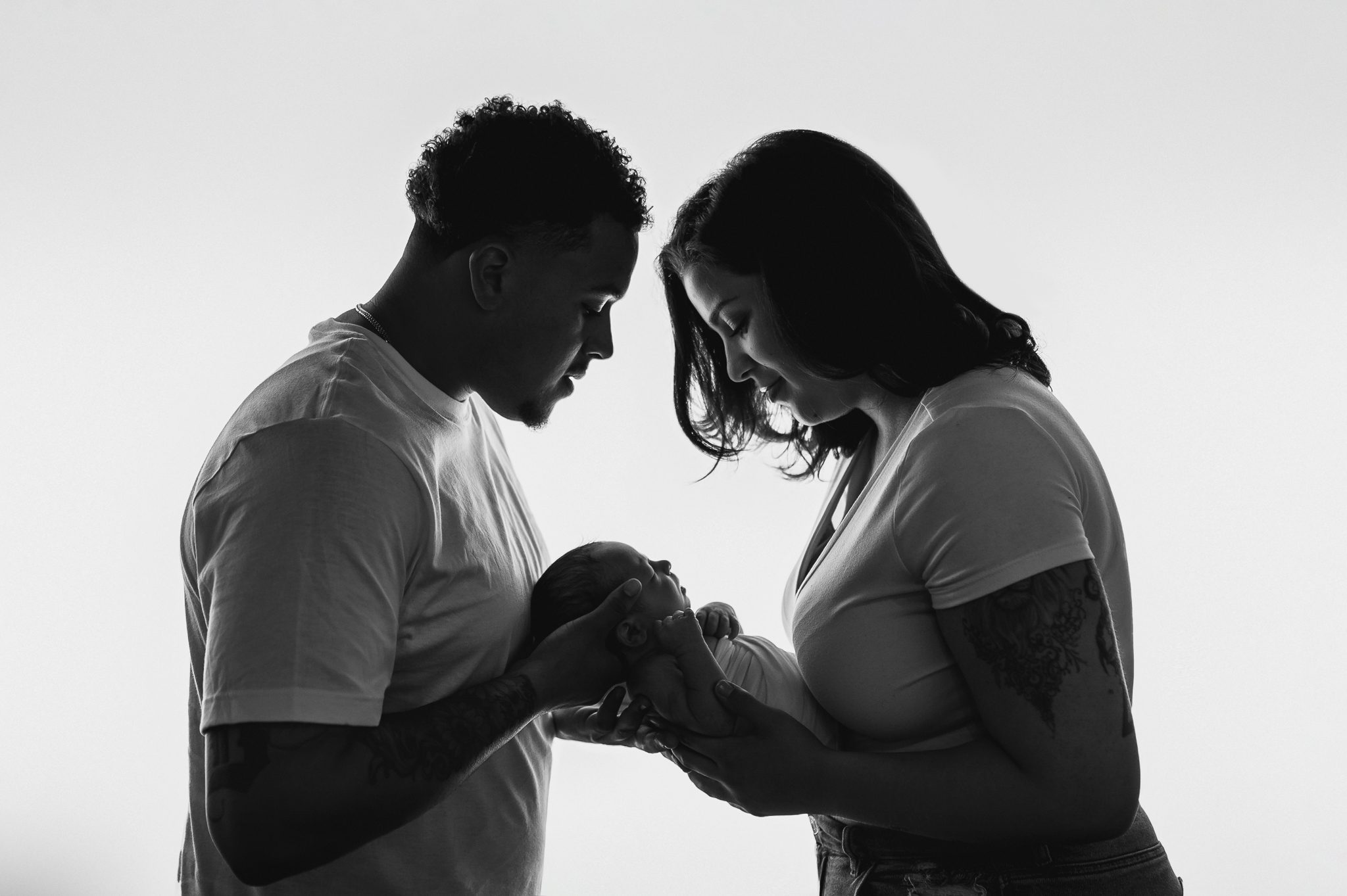 Artistic black and white newborn silhouette photography featuring a baby’s profile, captured by a creative photographer in Scotch Plains, NJ.
