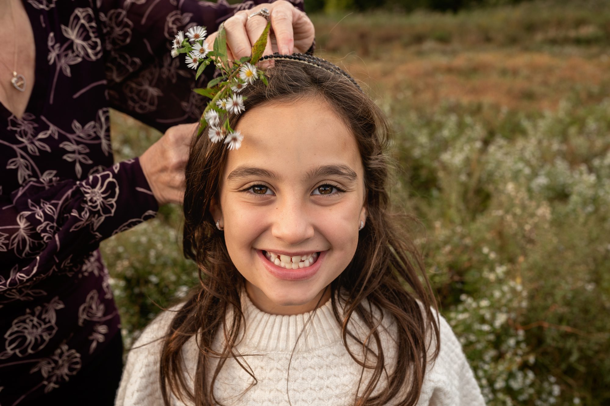 family plays and has fun at their outdoor family photography session