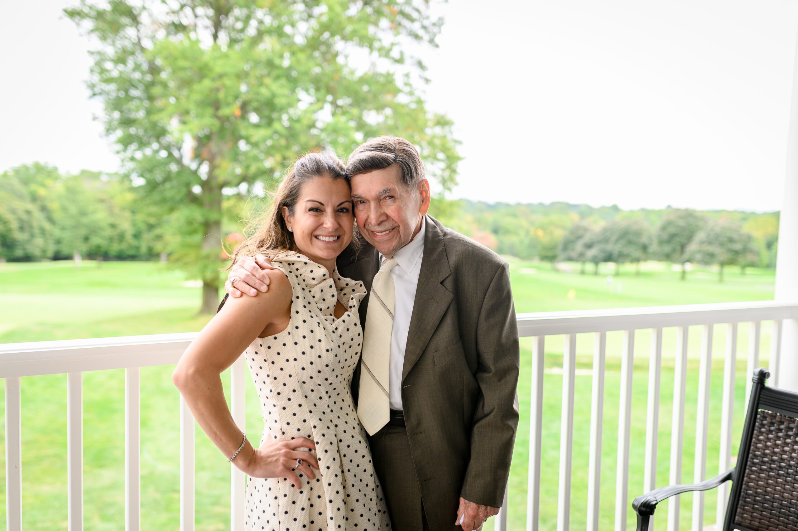 woman with her grandfather at her duaghter's communion at Glen Ridge Country Club
