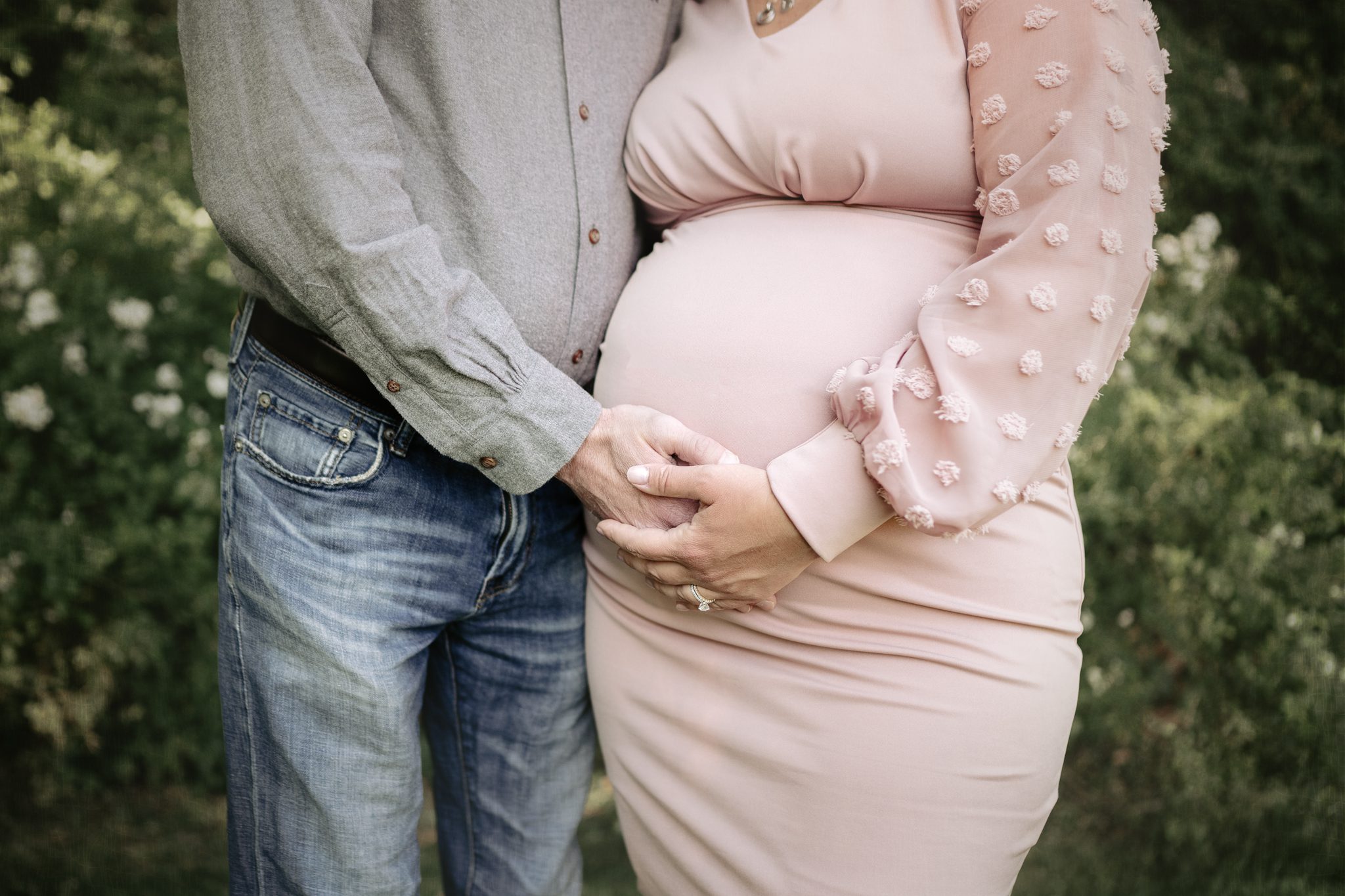 Maternity photography in Scotch Plains NJ featuring a mother and father expecting their second baby girl.