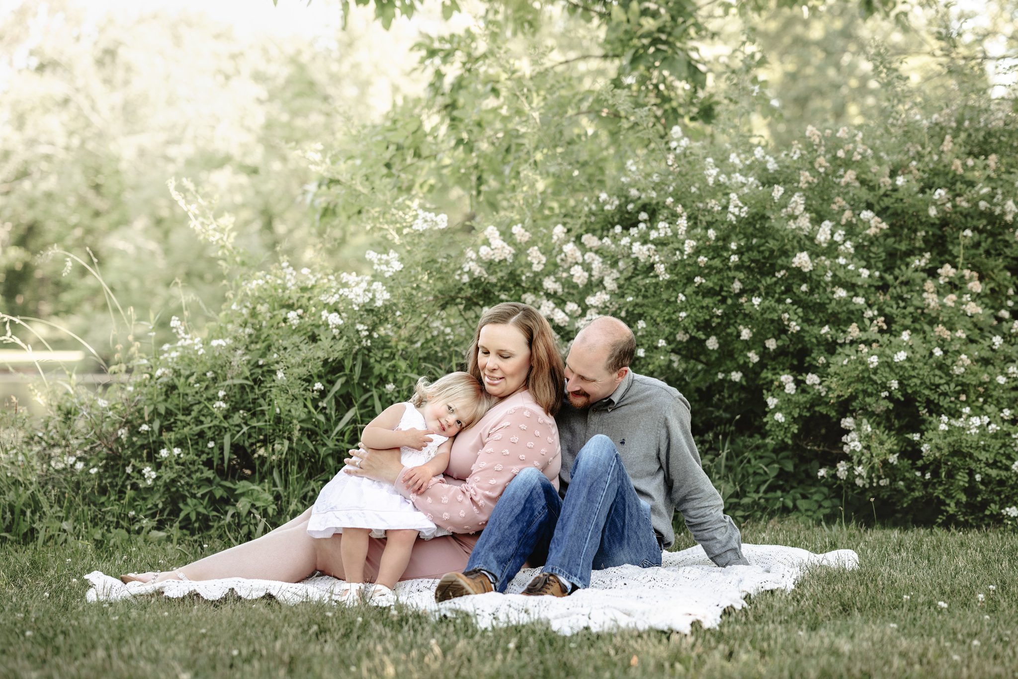 Maternity photography in Scotch Plains NJ featuring a mother and father expecting their second baby girl.