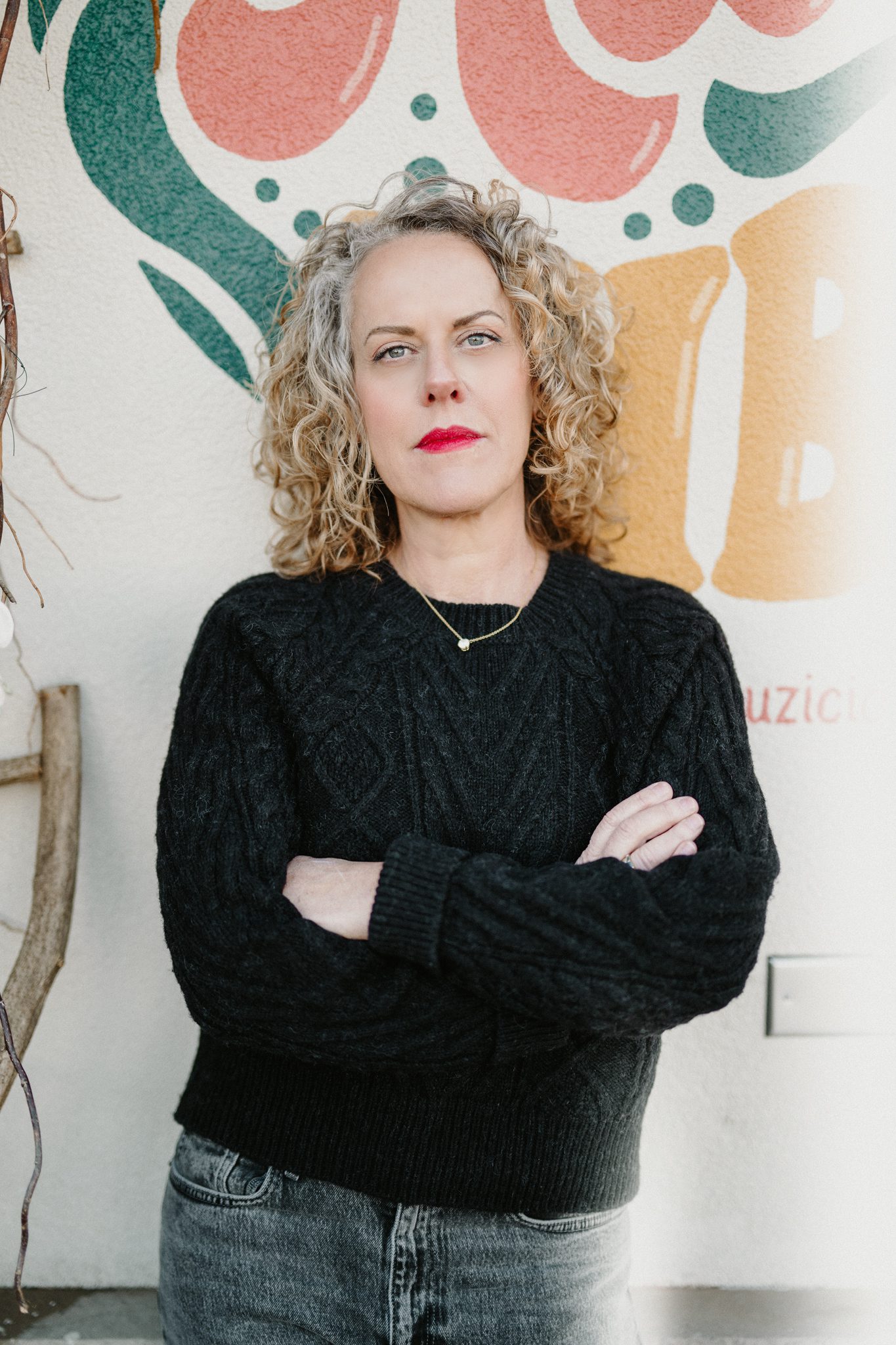 woman with blonde curly hair during her dating photoshoot