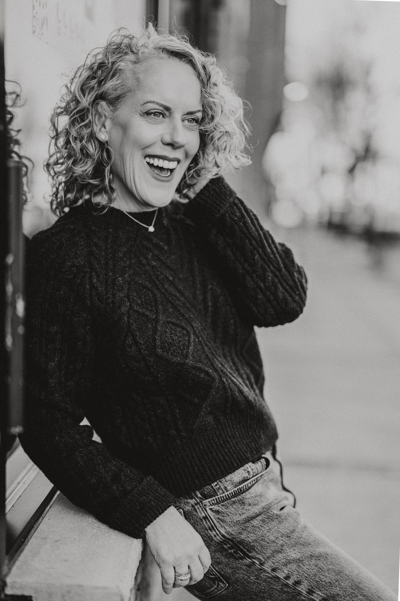 woman with blonde curly hair during her dating photoshoot