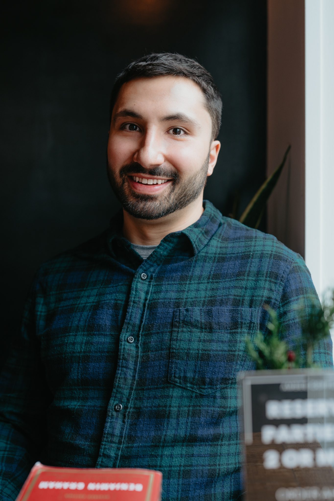 young man with brown hair and facial hair poses for his dating profile photography shoot with Joan Marie Photography in Somerville NJ