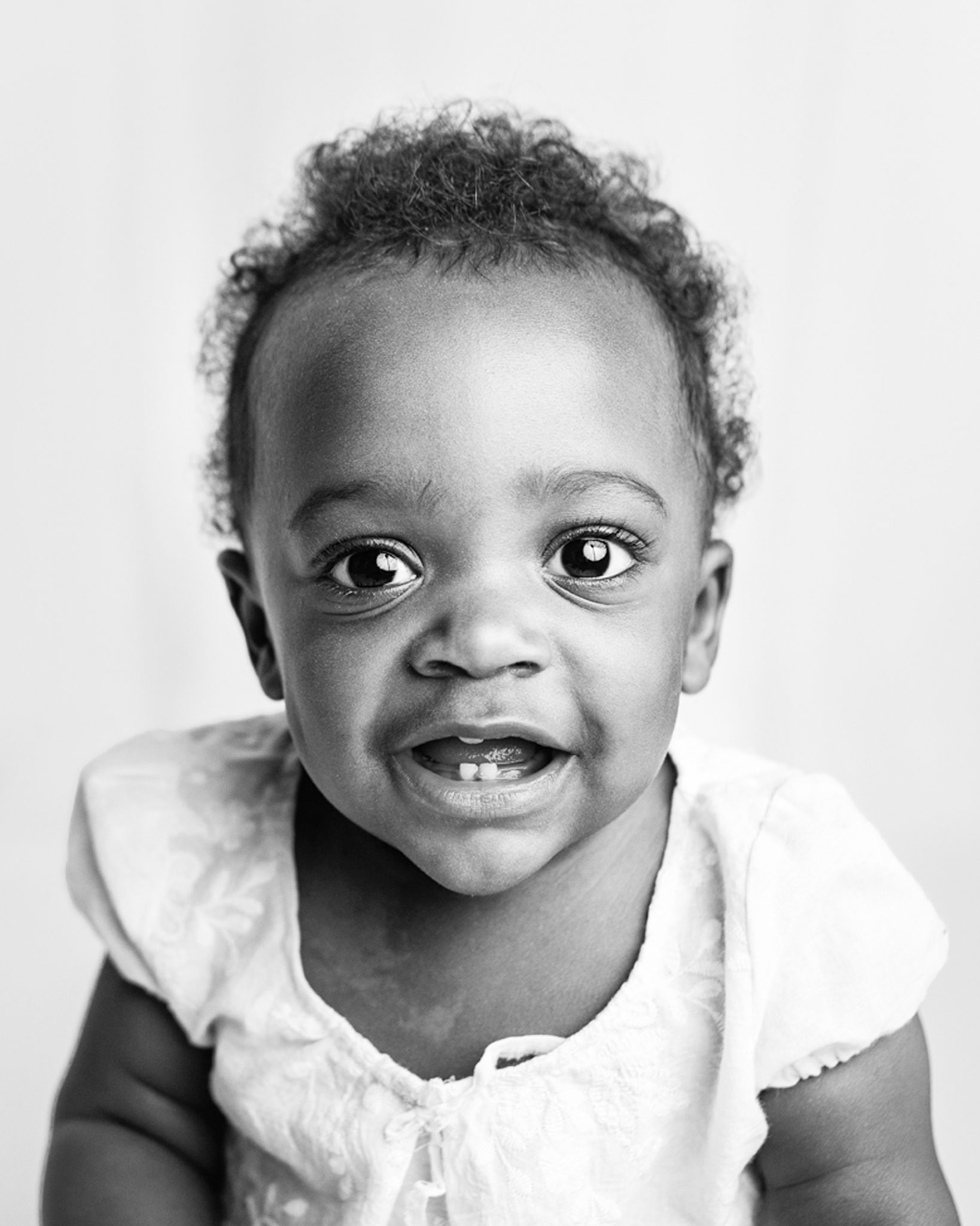 black and white photo of a little girl