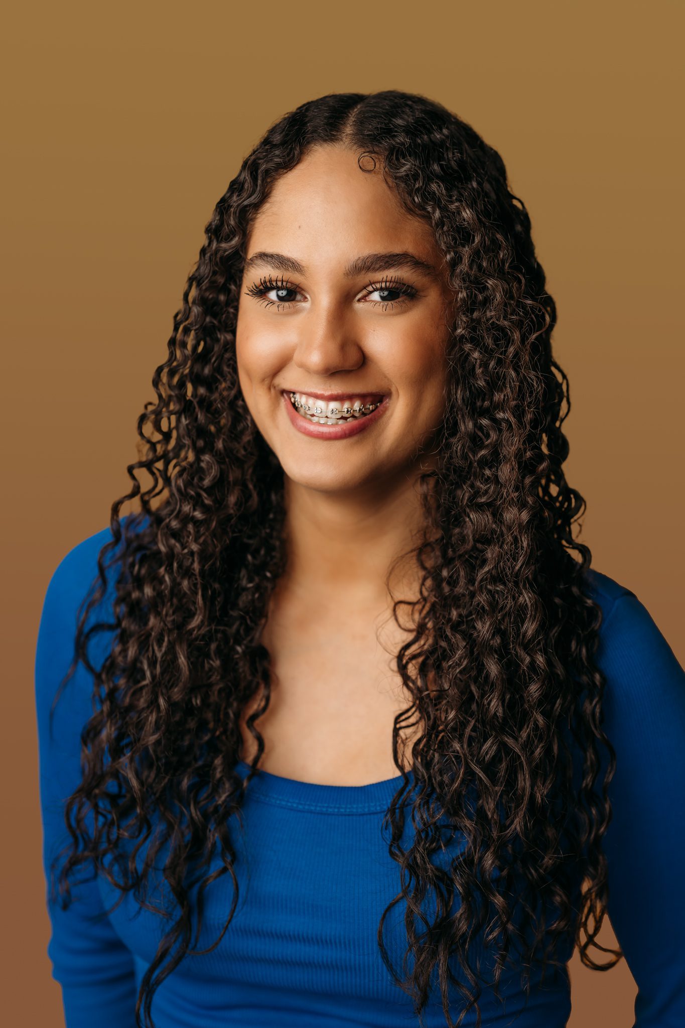 young actress posing for a headshot in professional photo studio