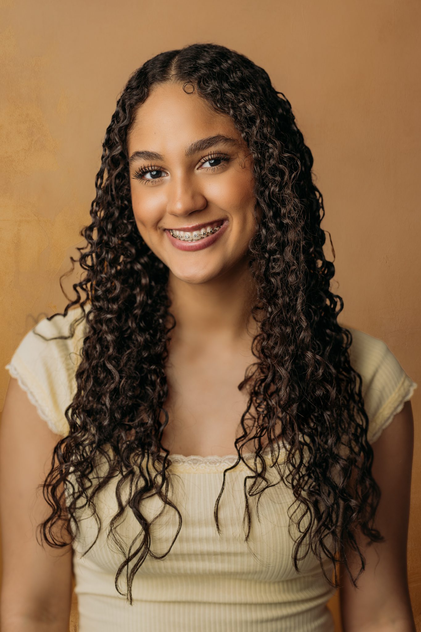 young actress posing for a headshot in professional photo studio