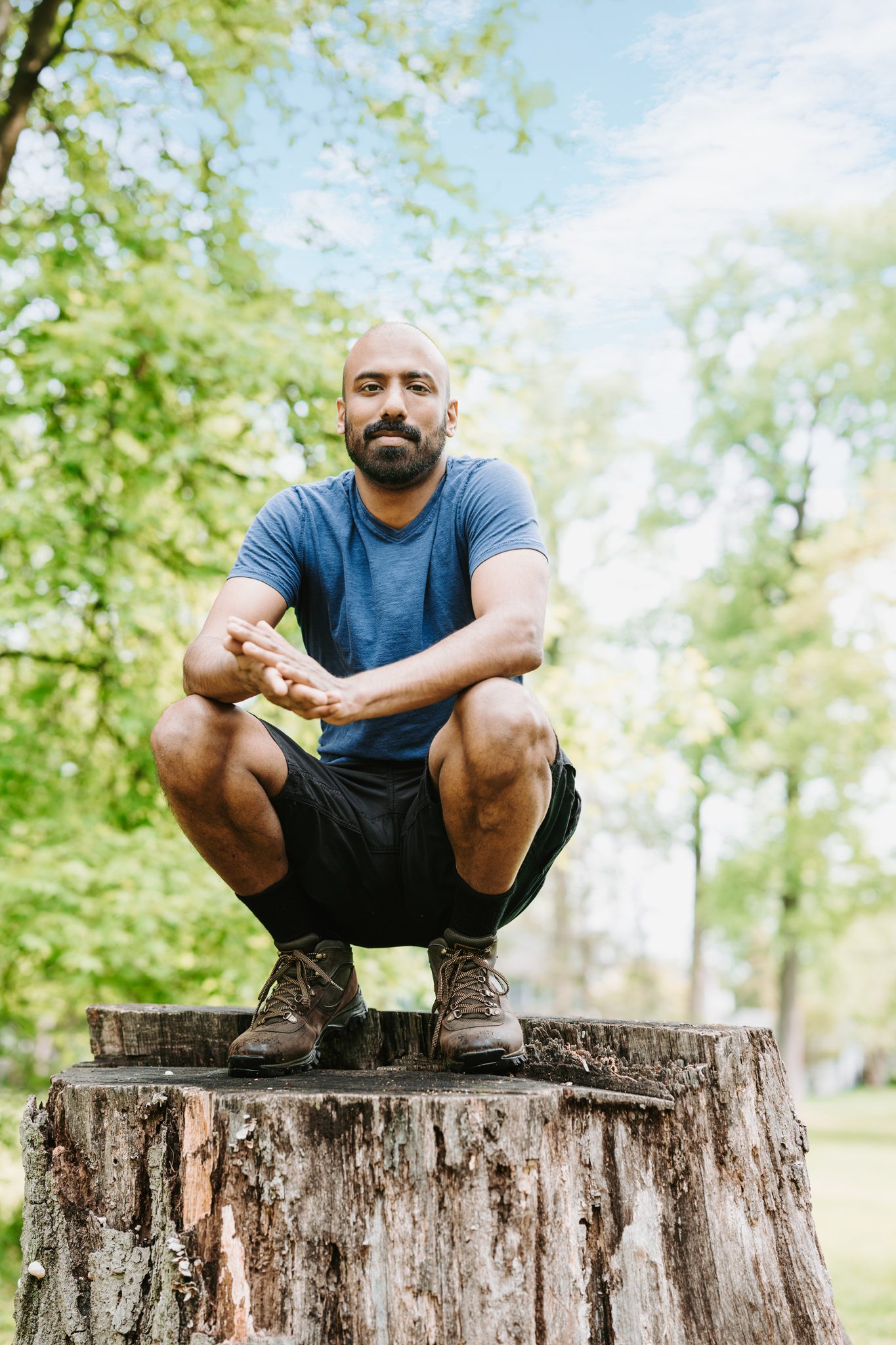 Young man with beard has photos taken for online dating apps
