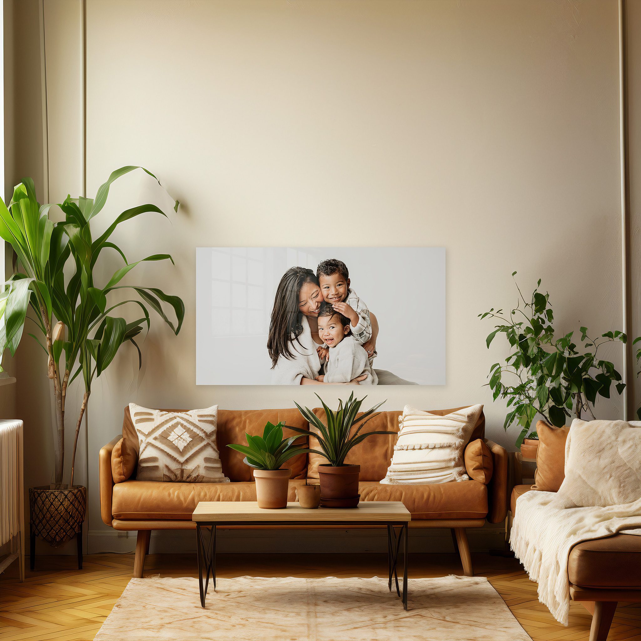 large photo of mother and sons hangs on living room wall