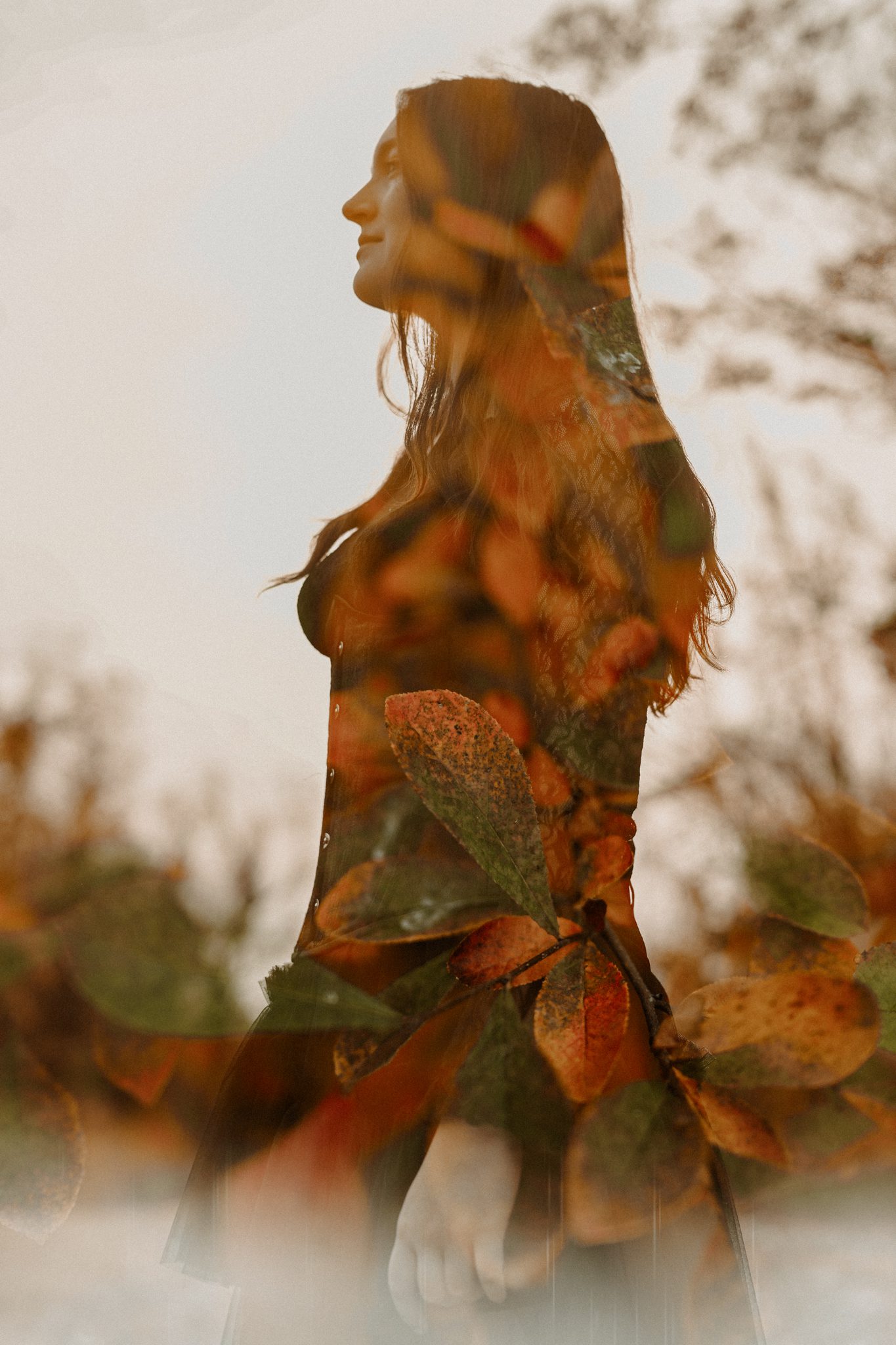 creative portrait double exposure of a high school senior with colorful fall leaves with Scotch Plains Senior Photographer Joan Marie