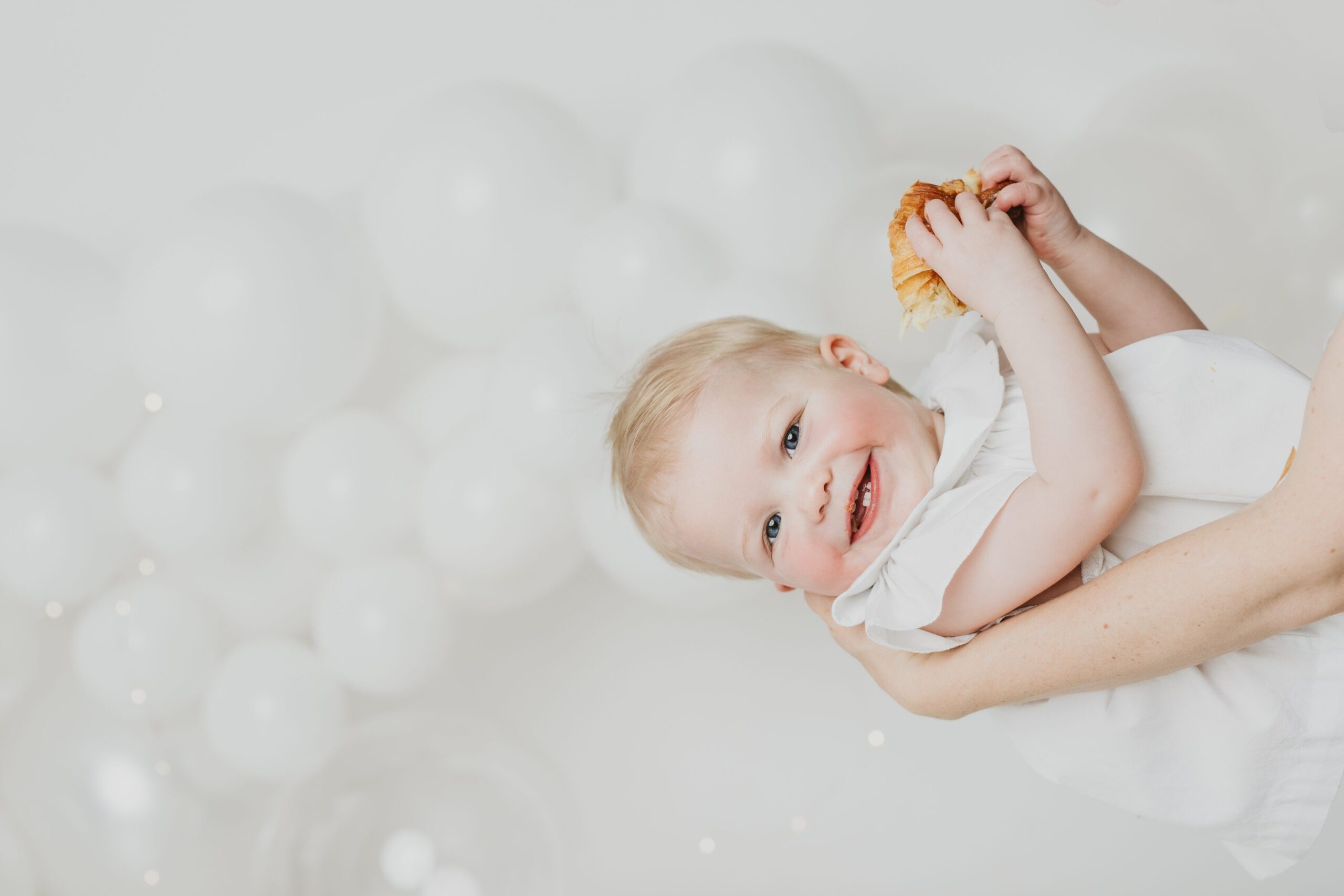 sweet blonde baby celebrates her first birthday with a photoshoot at Joan Marie Photography in Scotch Plains NJ