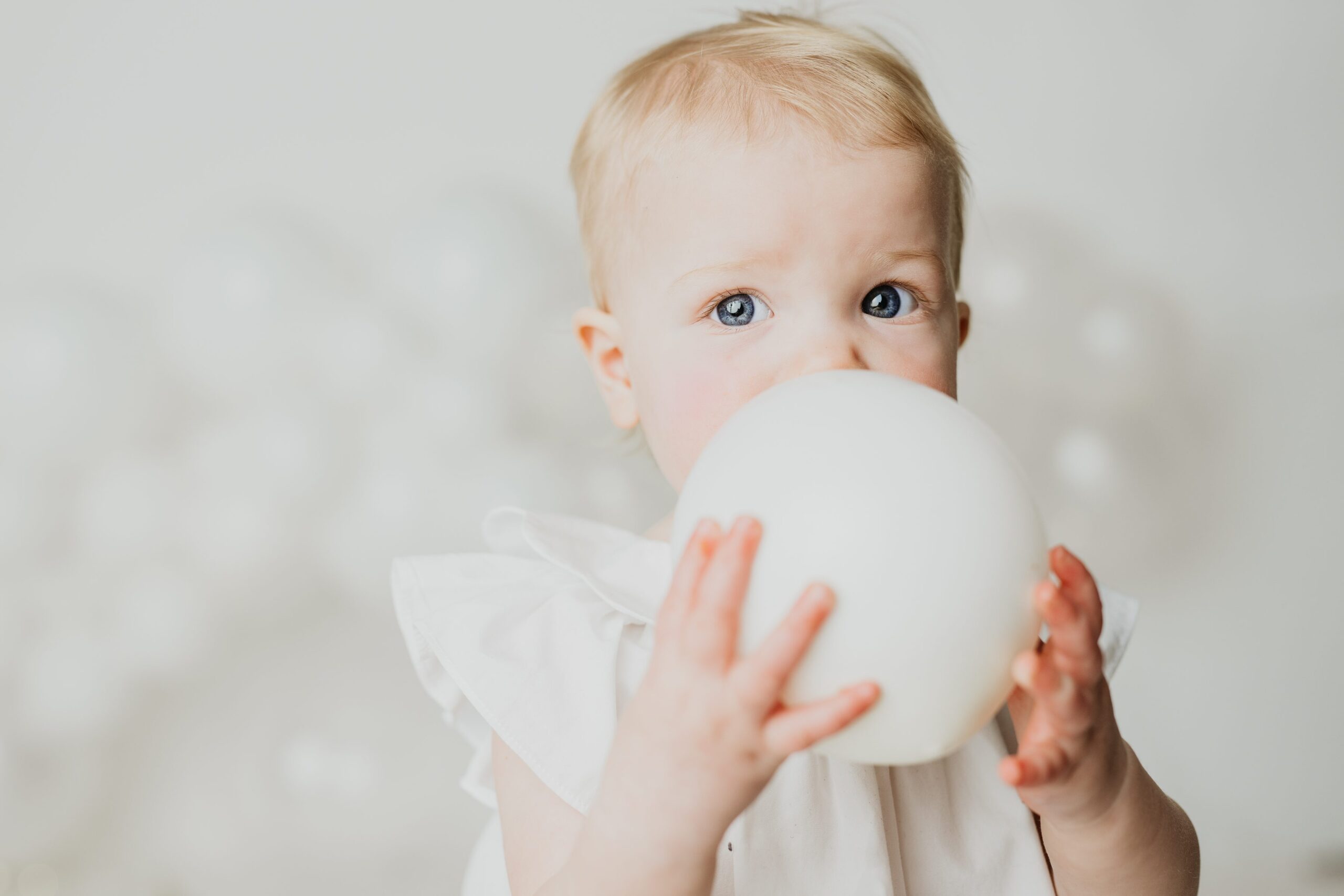 sweet blonde baby celebrates her first birthday with a photoshoot at Joan Marie Photography in Scotch Plains NJ