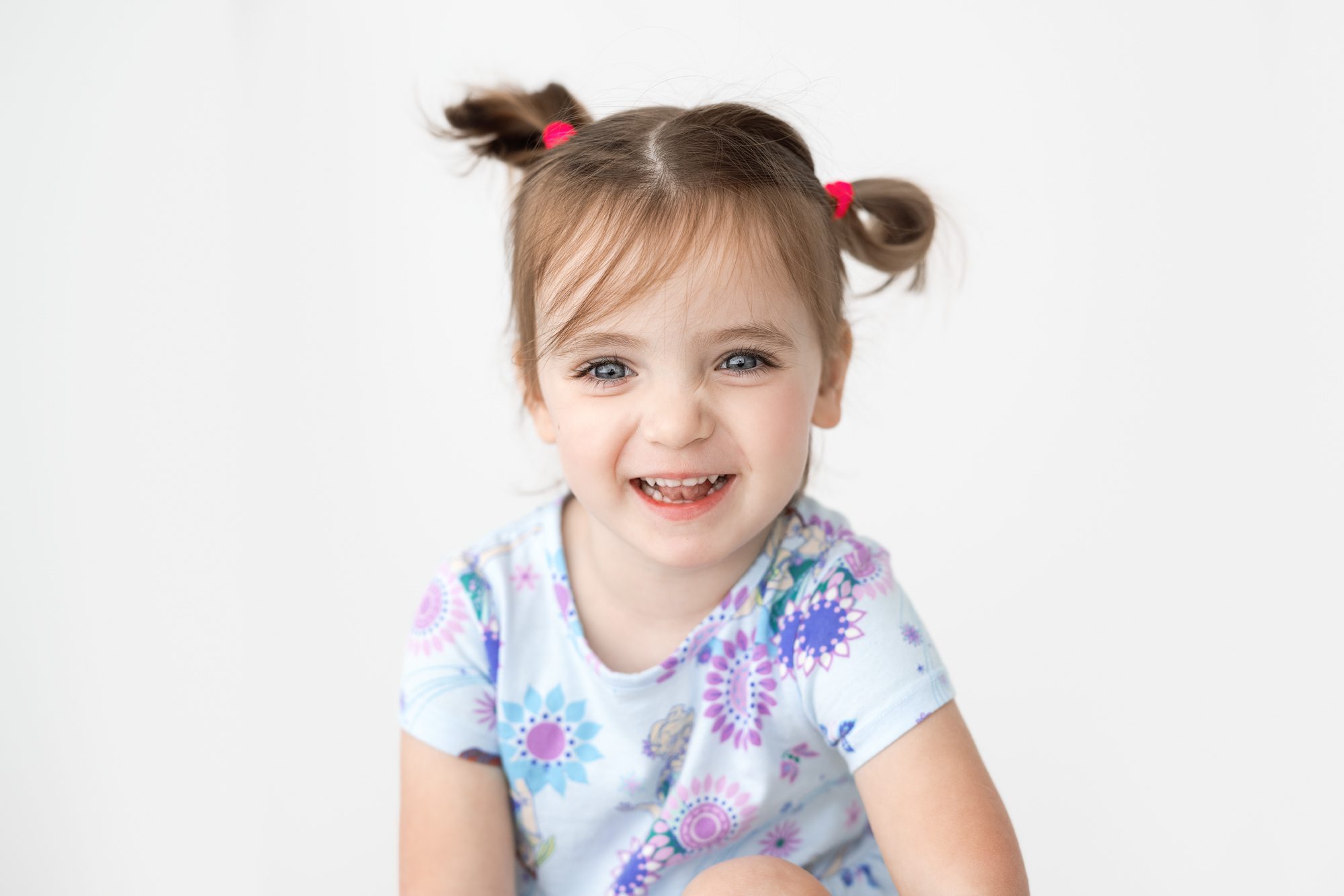 portrait of a cute little girl with pig tails in scotch plains nj with joan marie photography