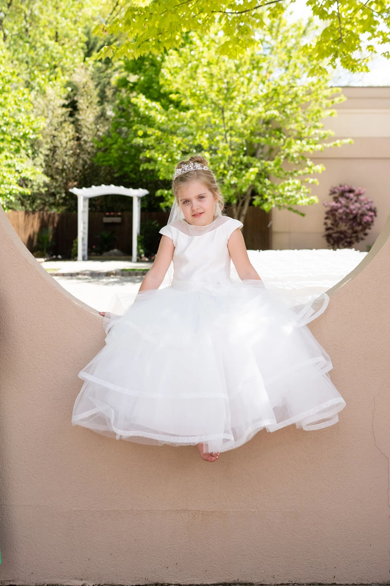 little communion girl takes a rest at her il tulipano reception party