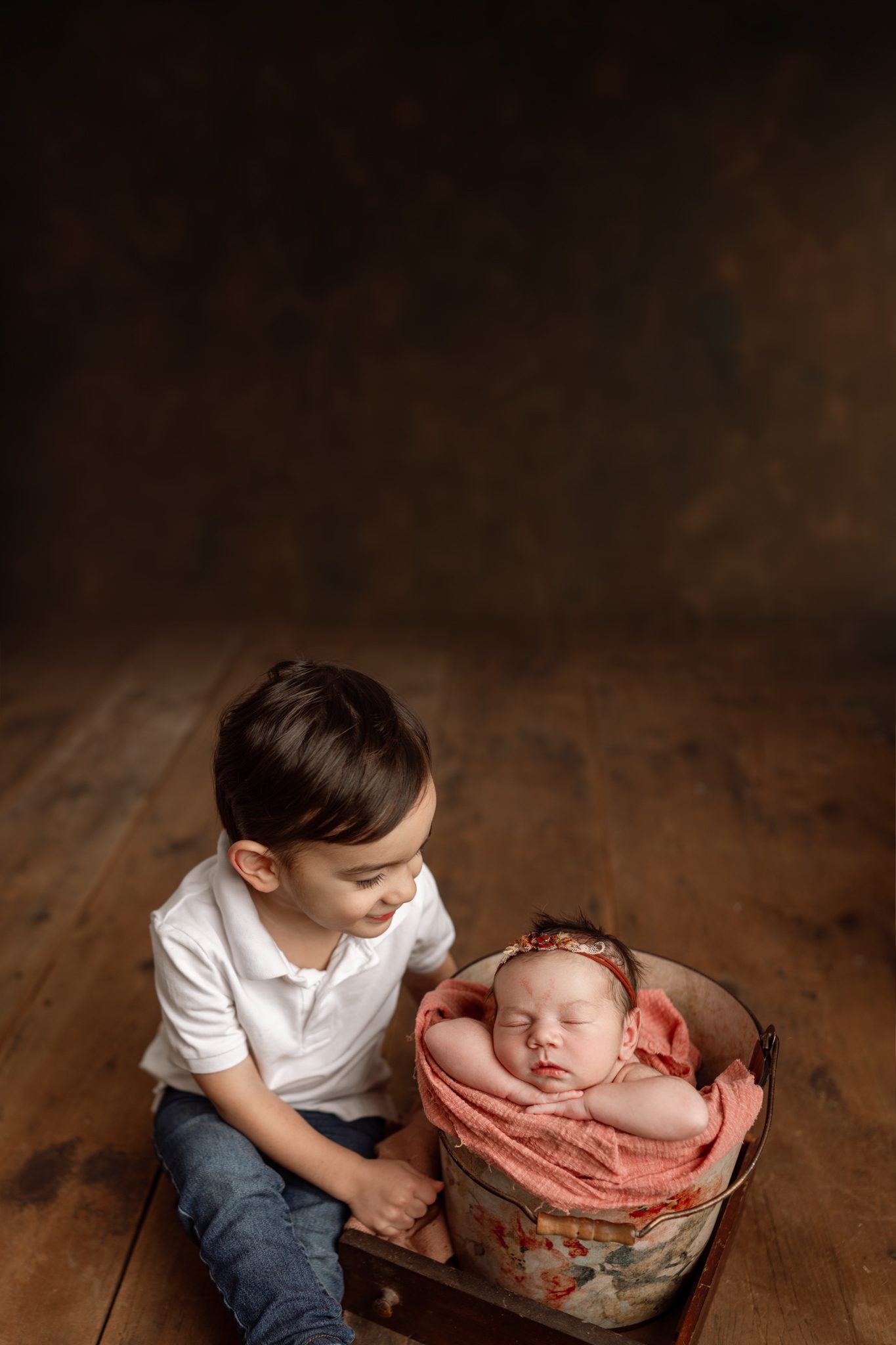 Sibling newborn photography Union County NJ featuring toddler brother and baby sister.