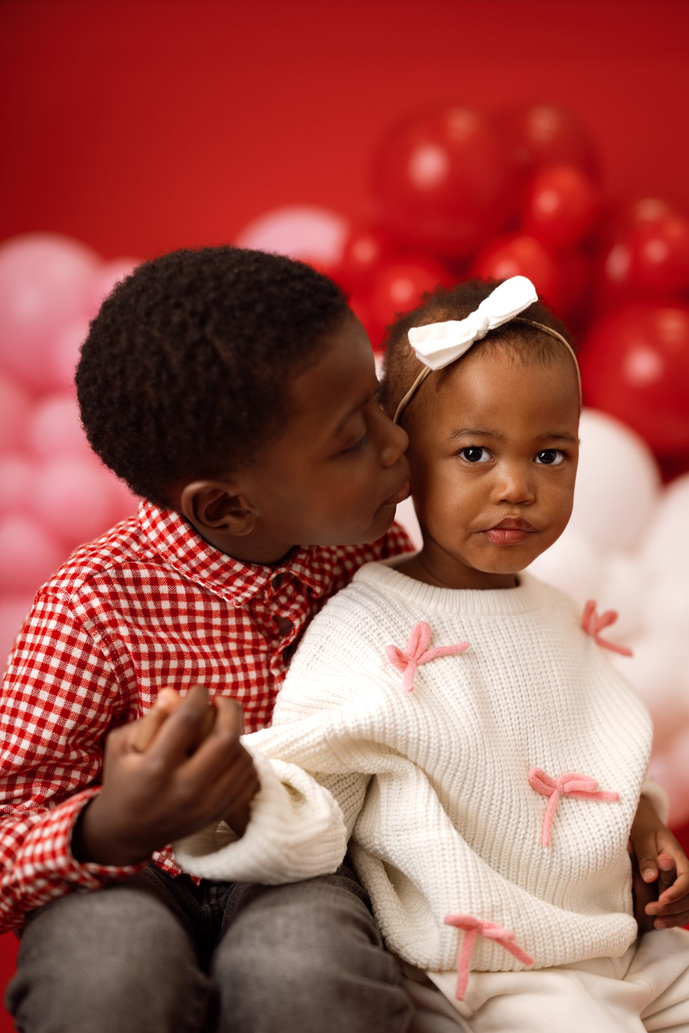 Professional child's portrait taken during a Valentine's Day pop-up event in Union County.