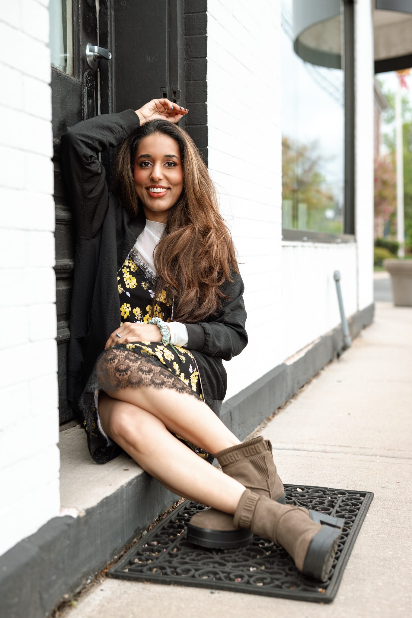 A stylish woman wearing European-inspired fashion during a dating profile photoshoot in downtown Metuchen.