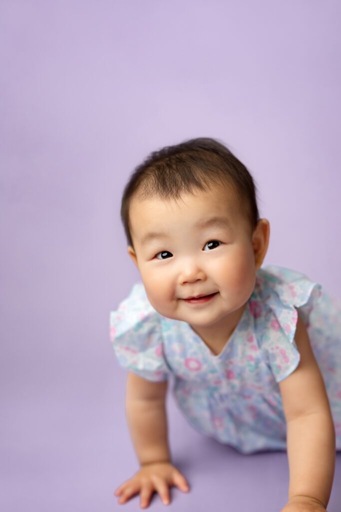 1st birthday portrait of korean baby on lilac backdrop